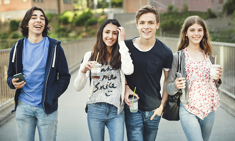 *** ROYALTY FREE - special pris *** Portrait of happy teenagers holding disposable glasses and smart phones on bridge. Keywords: 14-15 years, 16-17 years, Casual clothing, mixed race person, Bridge - Man Made Structure, day, fruit, drink, beverage, liquid, drink, beverages, drinks, Disposable Glass, Europe, photography, front view, leisure time, Four people, color image, refreshment, togetherness, Group of people, high school student, walking, Horizontal, holding, Hands In Pockets, hanging out, focus on foreground, juice, juices, caucasian ethnicity, communication, Arts Culture And Entertainment, latin american and hispanic ethnicity, smiling, lifestyle, happiness, food and drink, middle eastern ethnicity, mobile phone, Multi-Ethnic Group, portrait, enjoyment, fun, side by side, confidence, Scandinavia, Smart phone, city life, Stockholm, Drinking Straw, Sweden, Sodermalm, technology, looking at camera, teenage boys, teenage girls, teenager, three quarter length, wireless technology, bonding, connection, urban, outdoors, friend, friendship
 Modelreleased: YES
 Maskot RF, 45857-46756, 0416